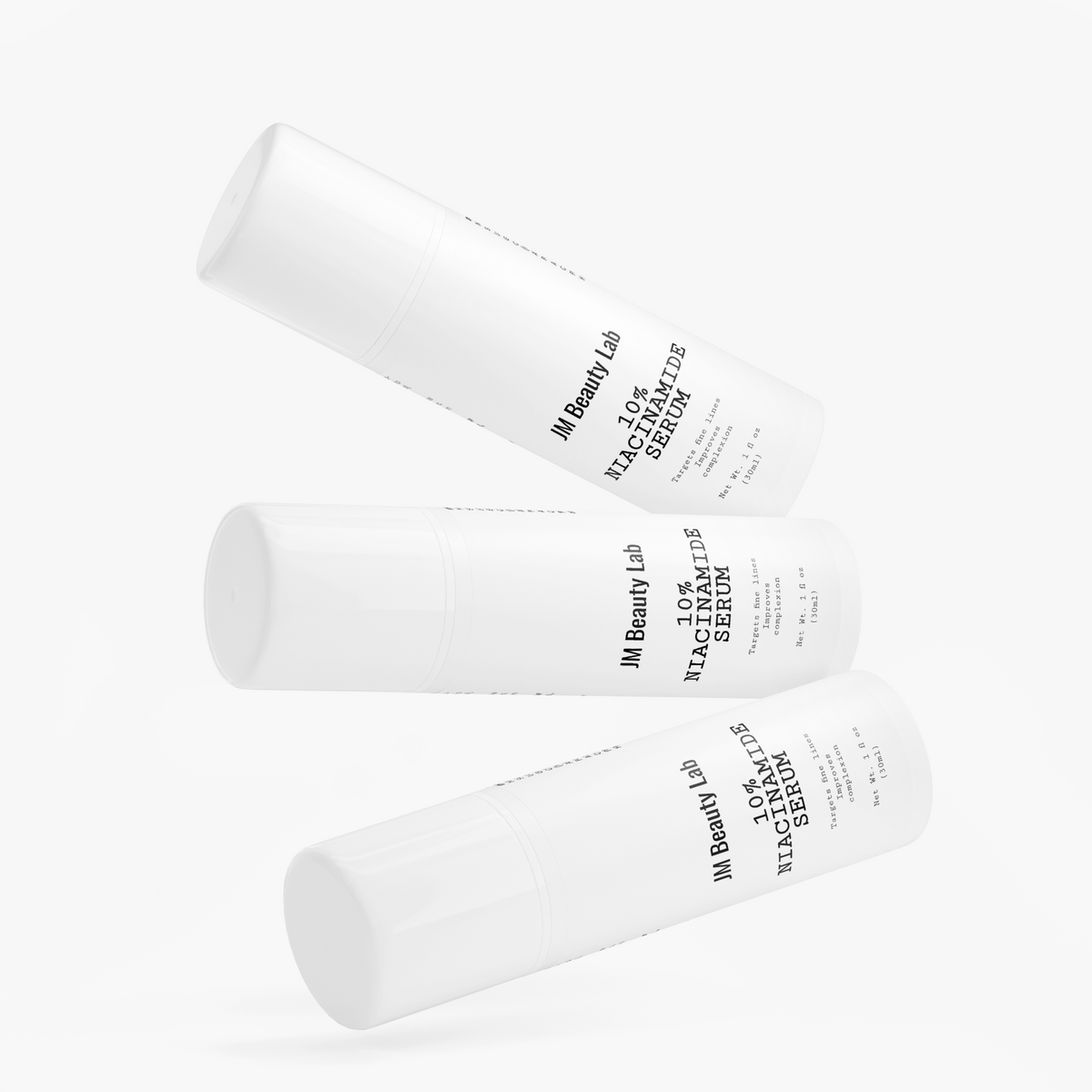 Niacinamide serum bottles by JM Beauty Lab, white angled back-label view