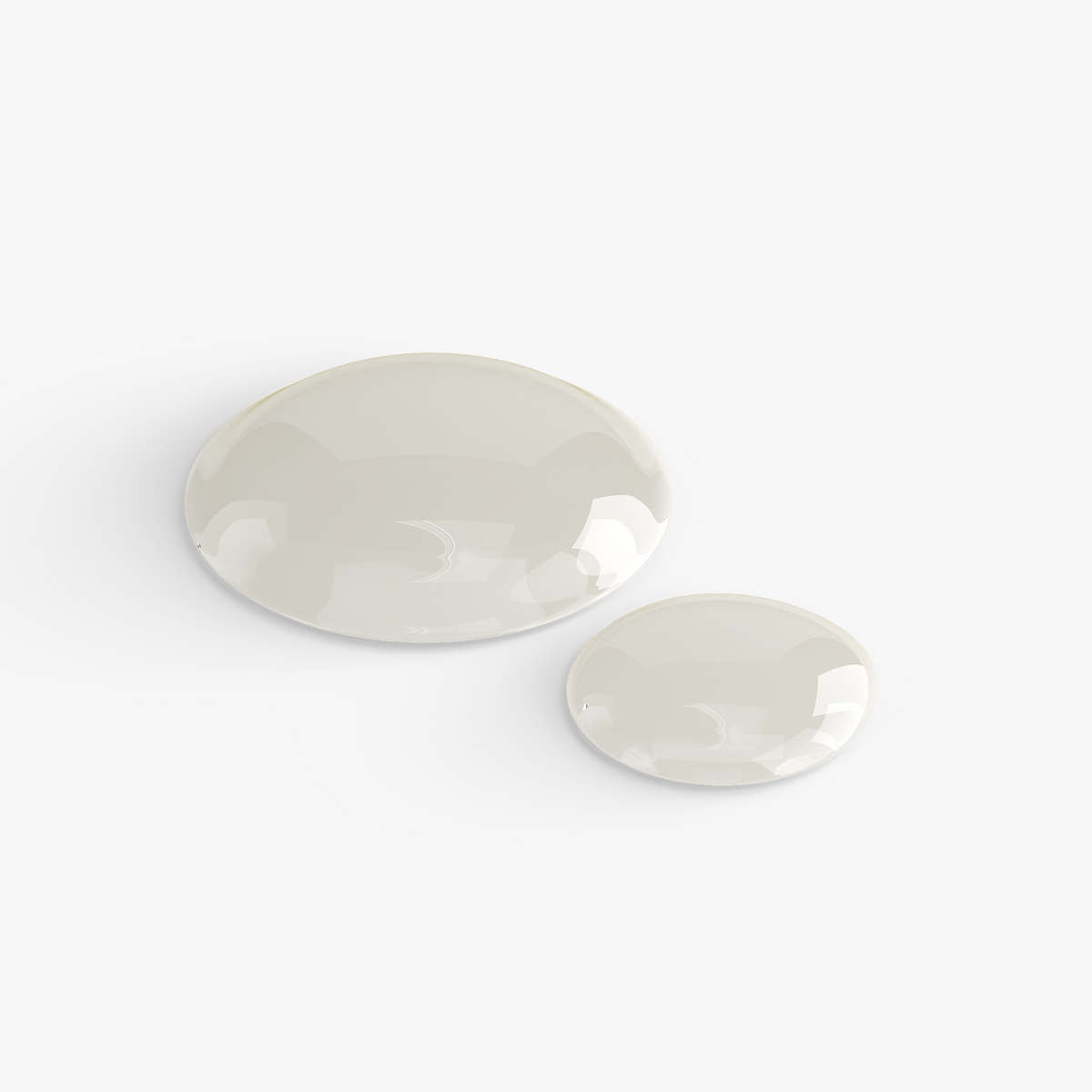 Facial gua sha stone set: two oval, translucent pale jade tools for skincare massage