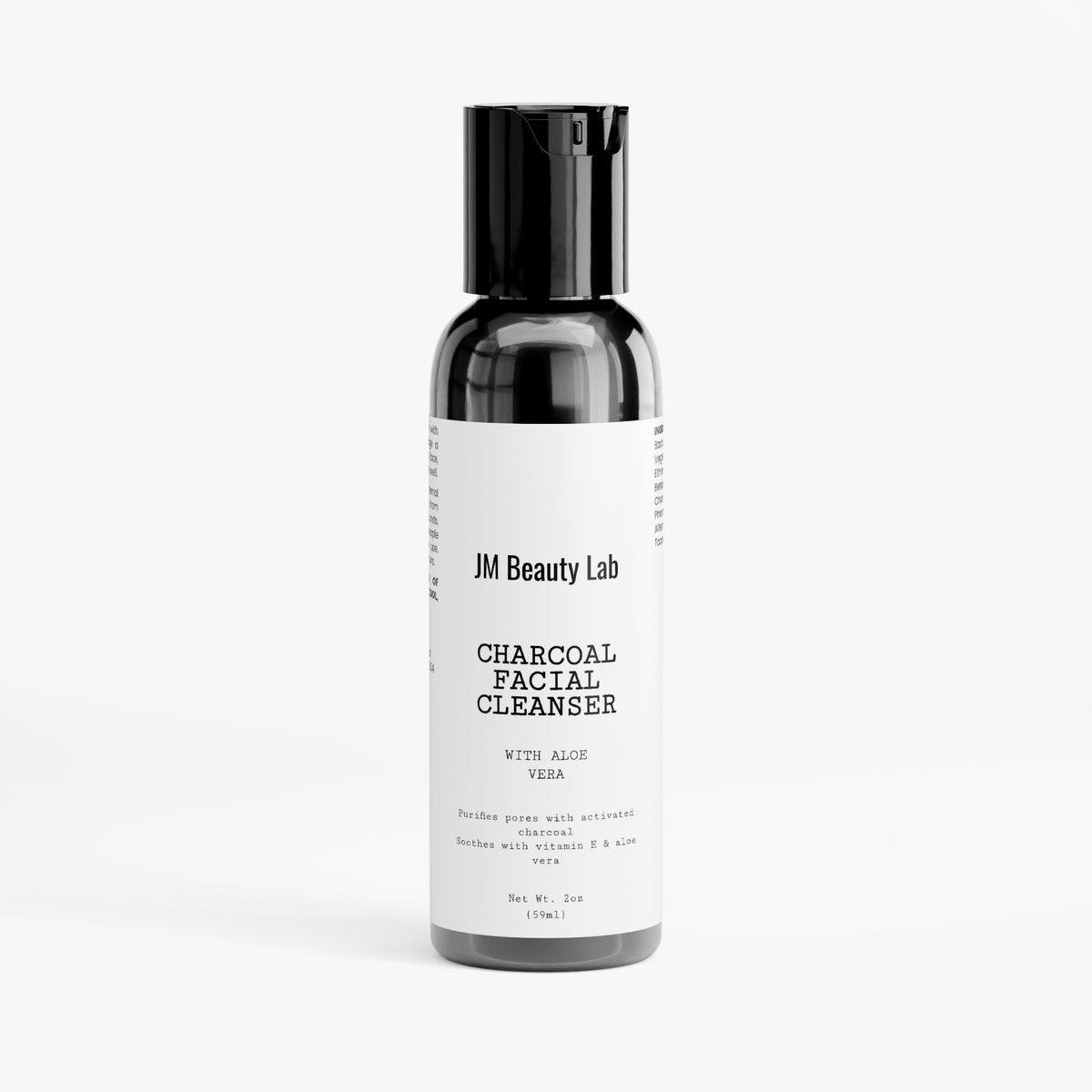 Charcoal facial cleanser bottle with black pump, JM Beauty Lab label