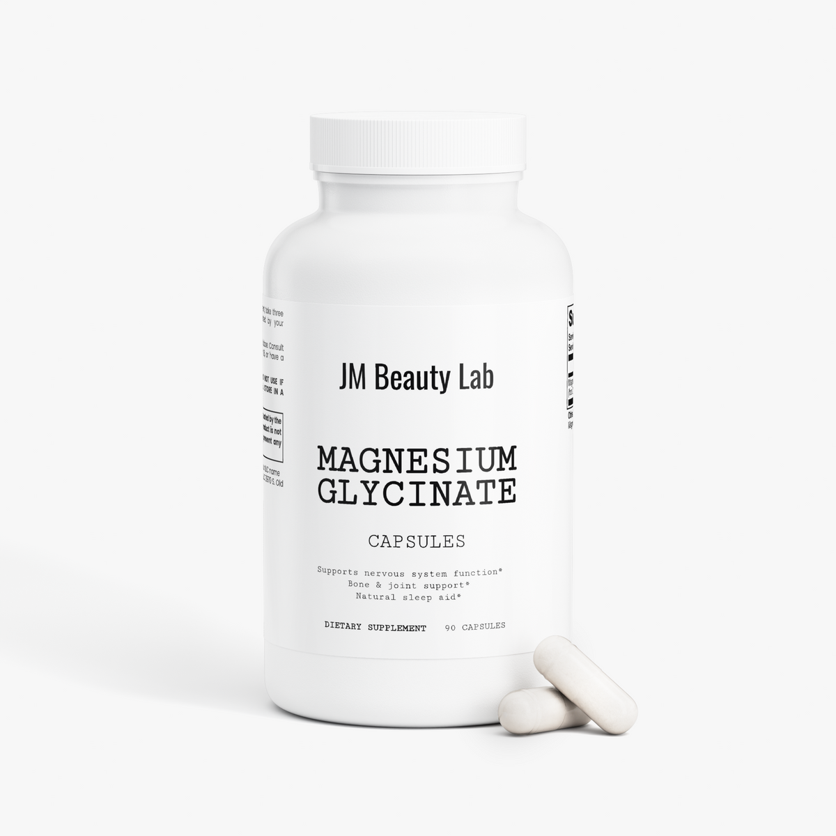 Magnesium glycinate supplement bottle with single white capsule on floor