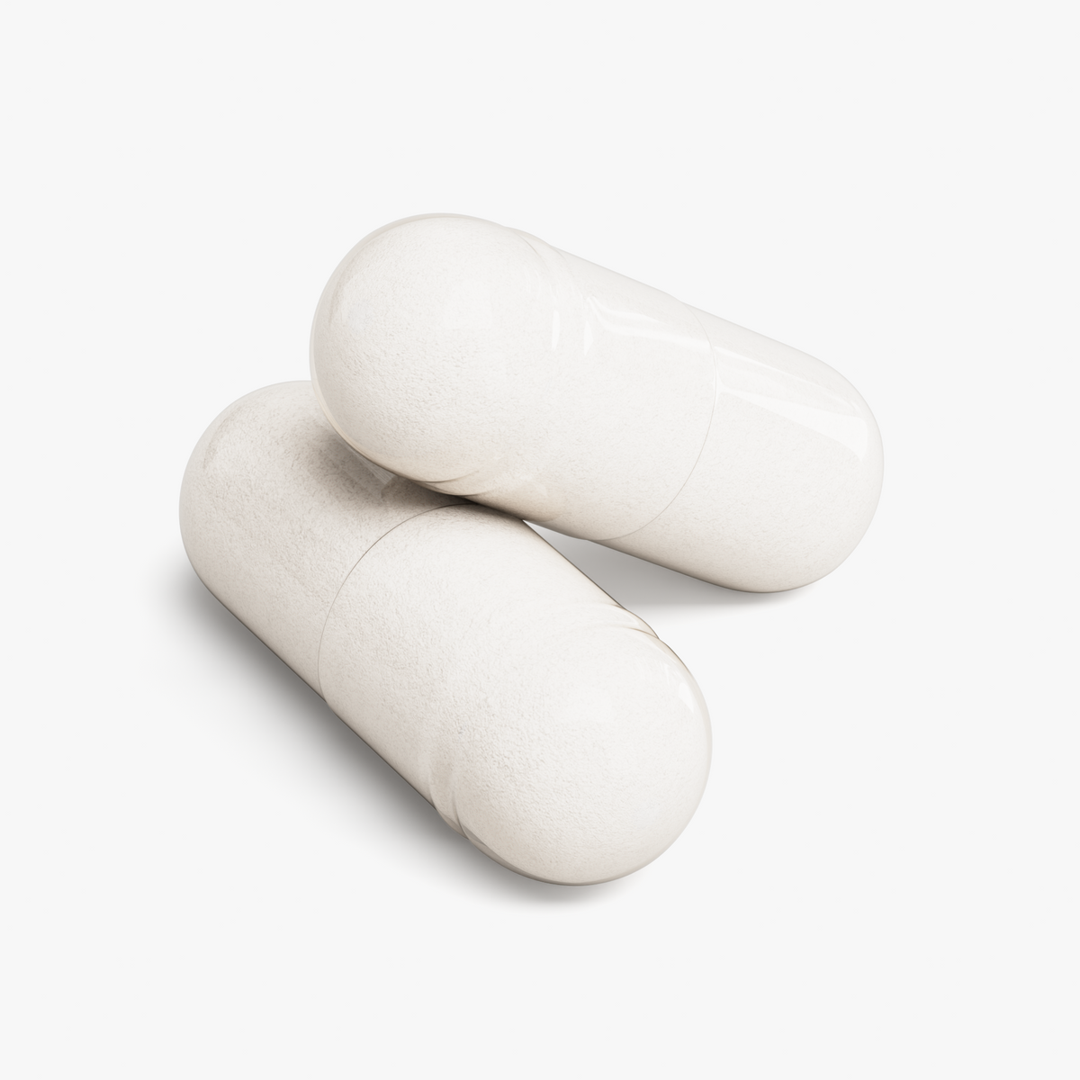 White magnesium glycinate capsules, two close-up
