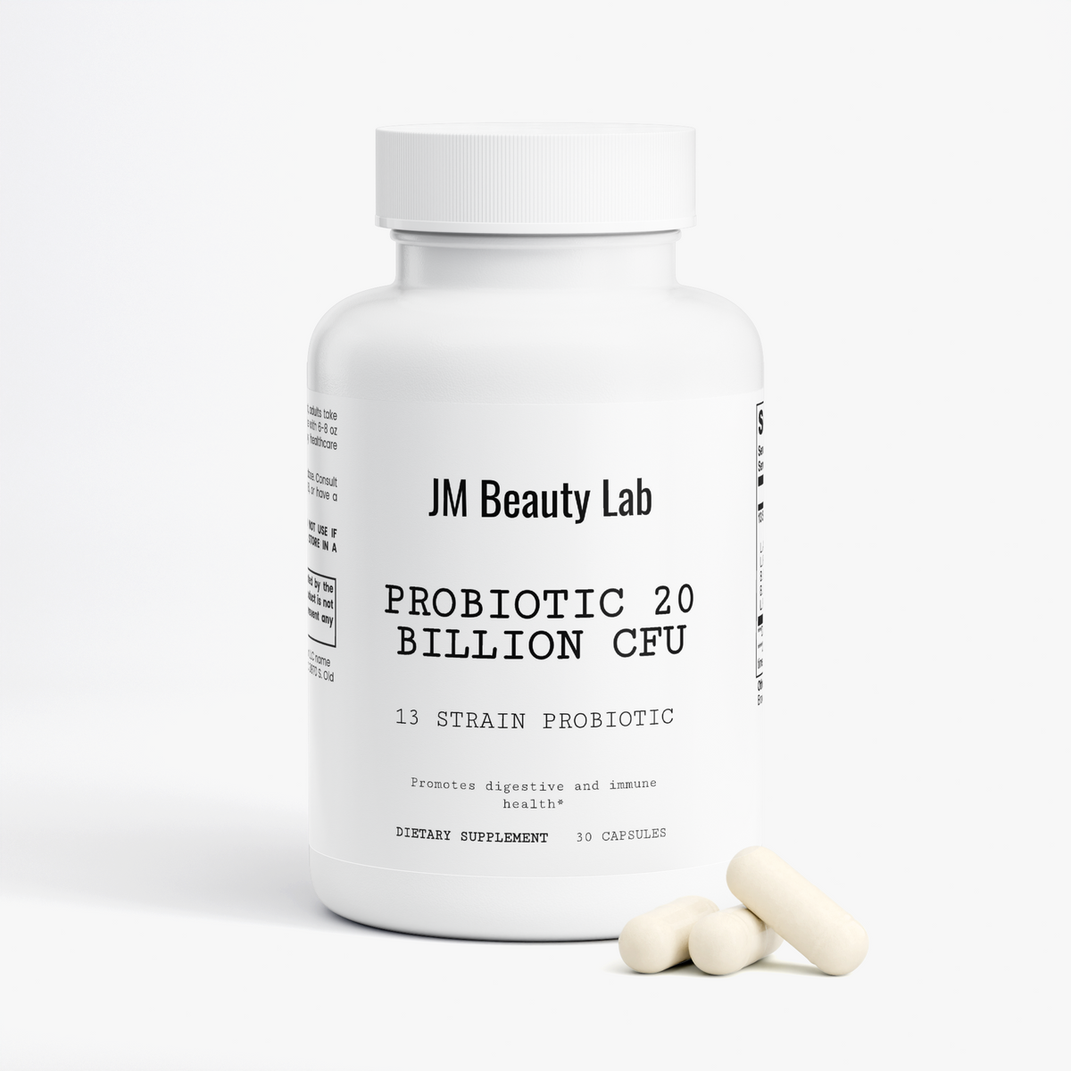 Probiotic supplement bottle with JM Beauty Lab label and capsules beside it