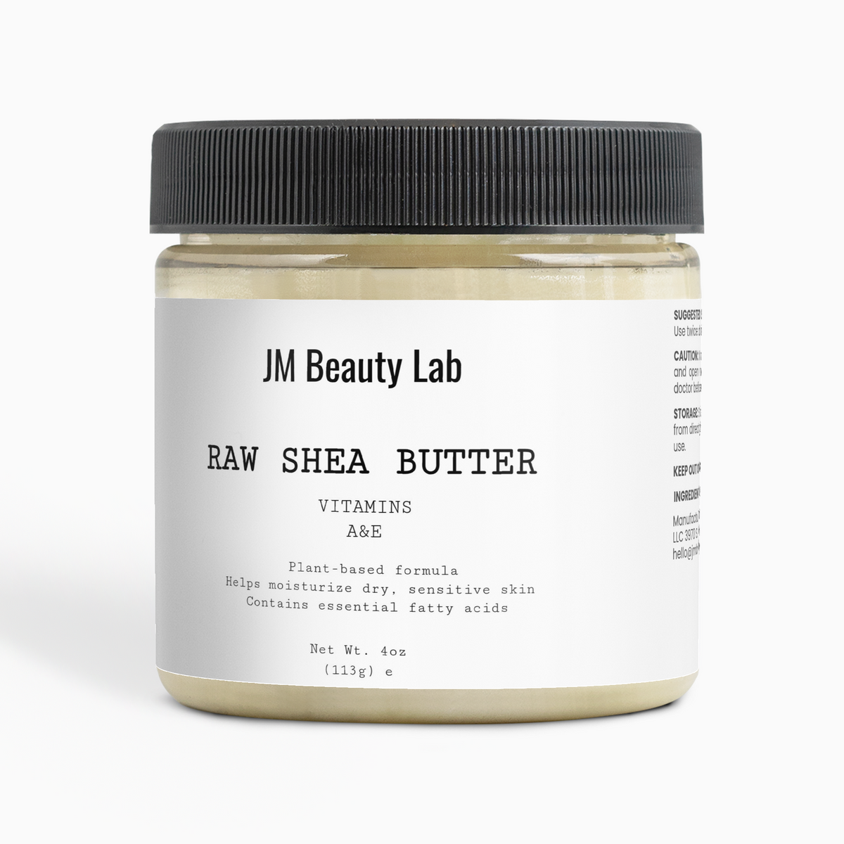 Raw shea butter jar with black ribbed lid and cream-colored body