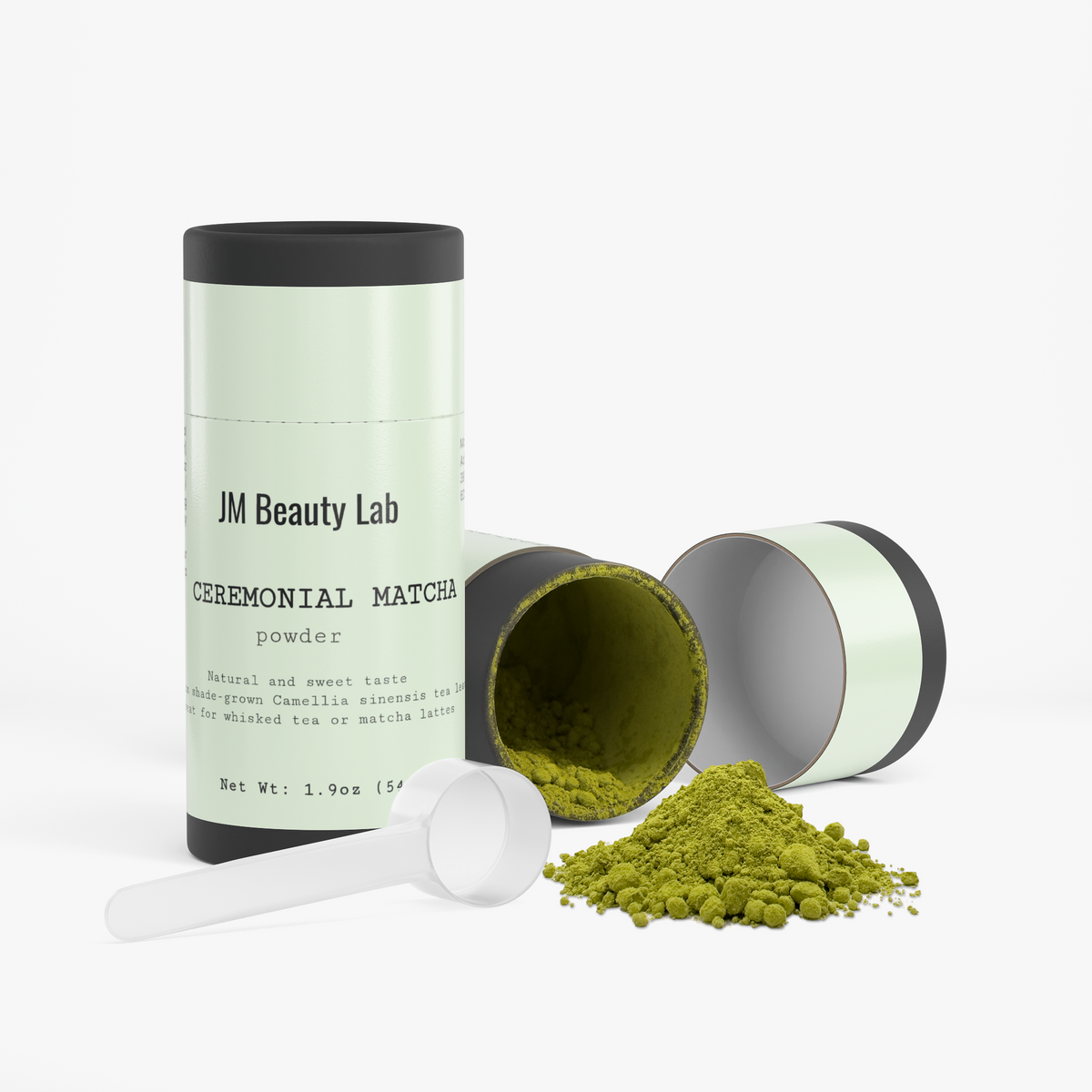 Ceremonial matcha powder canister with scoop and open jar of matcha
