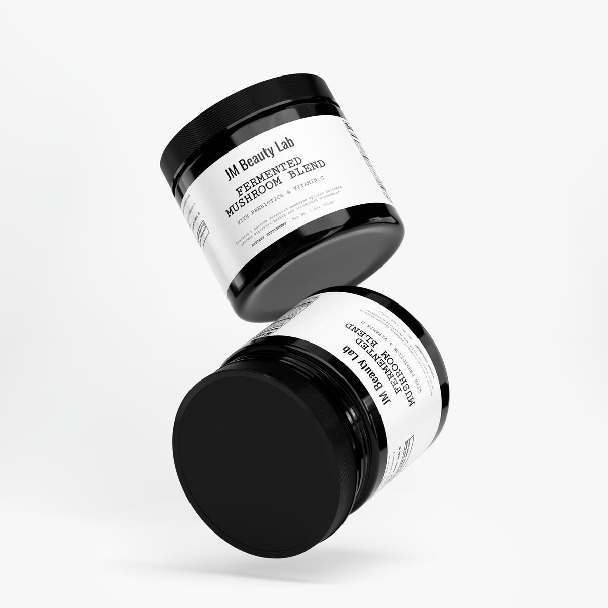 Fermented mushroom blend supplement jars, one tilted and one standing upright