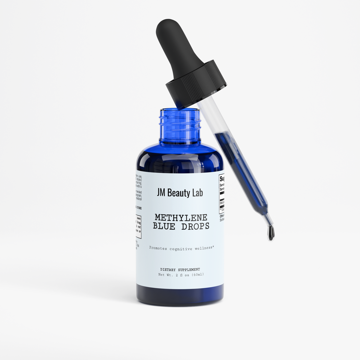 Methylene blue drops serum bottle with black dropper and clear blue liquid pipette